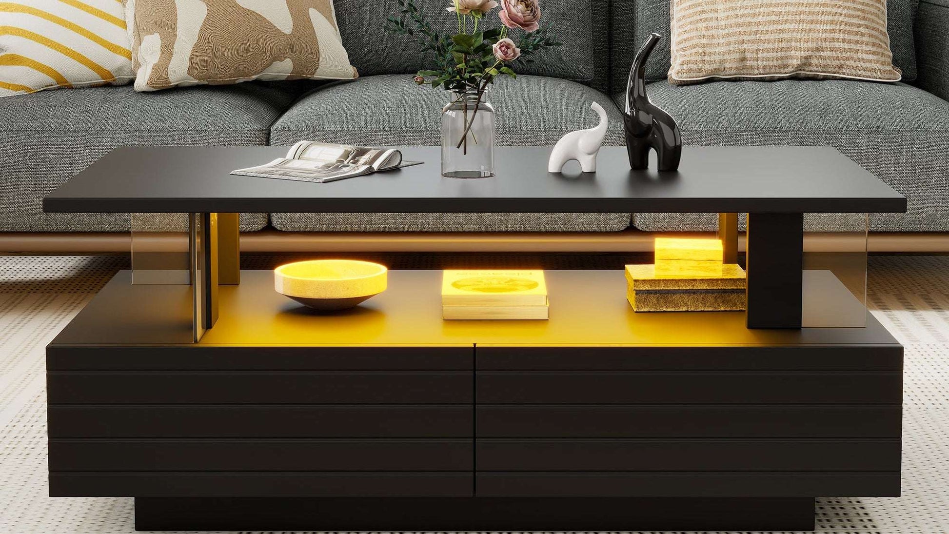 Modern living room with a gray sofa, black coffee table, and decorative items.