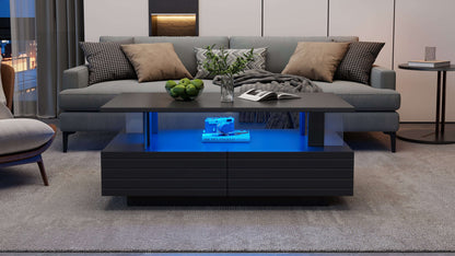 Modern living room with a gray sectional sofa and a coffee table with blue LED lighting.