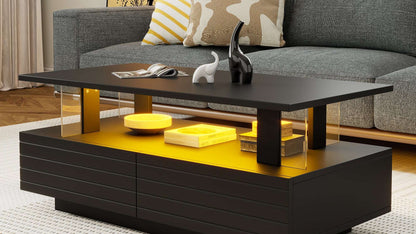 Modern black and yellow coffee table in a living room setting with a gray sofa and decorative pillows.